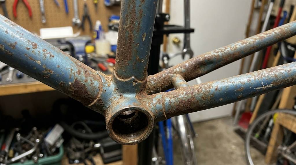 Applying rust resistant paint to a restored steel frame