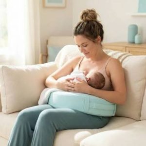 Mother after a C-section using a supportive nursing pillow for breastfeeding