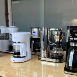 Affordable coffee maker brewing fresh coffee in a modern home kitchen